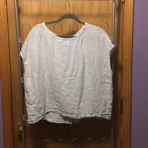 Light blue top. Clean, needs to be ironed.